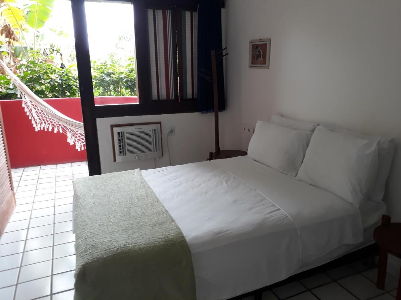 Novos Baianos Hostel E Pousada Porto Seguro Eksteriør billede A room at the hotel